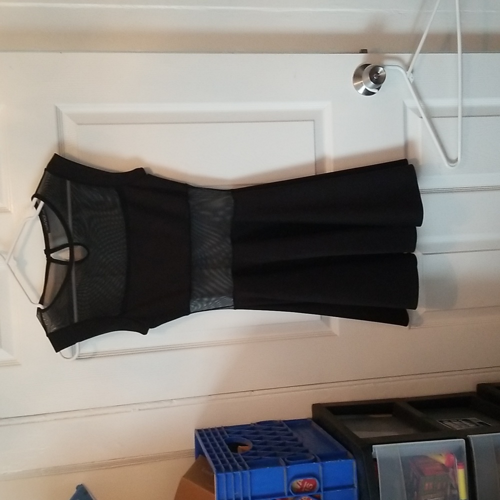 Womans black sheer dress